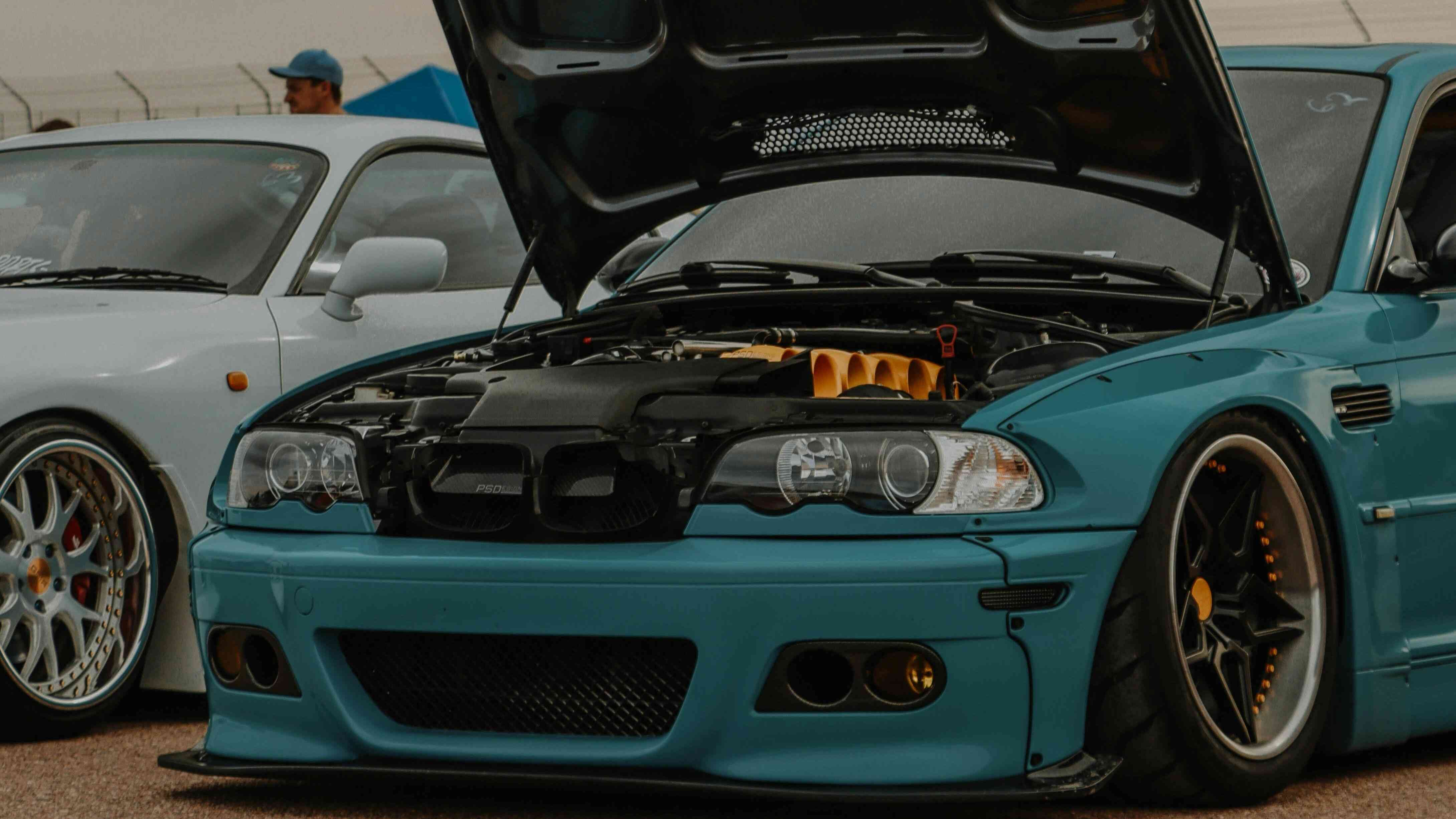 Parked Car with An Open Hood