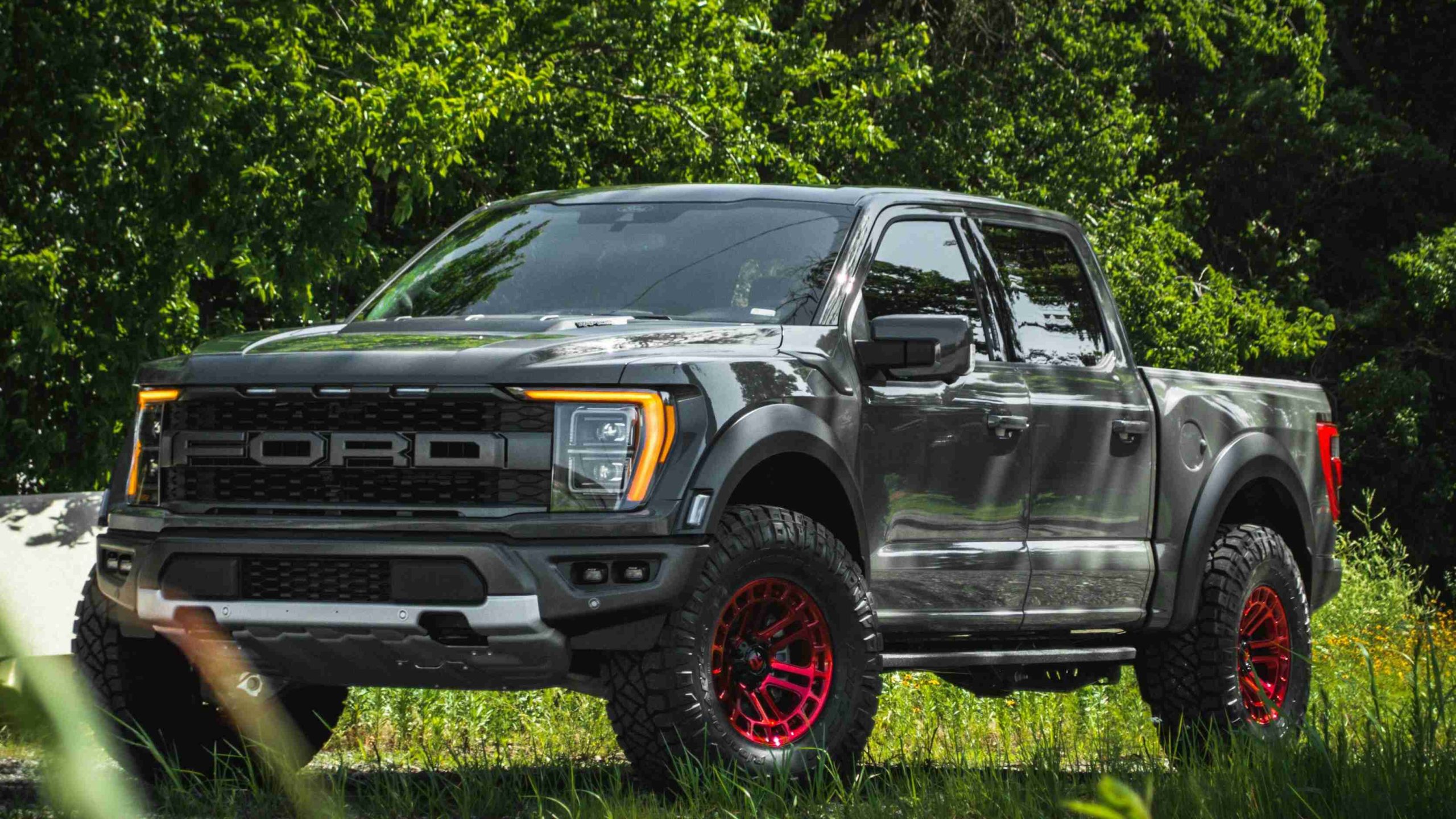 Gray Ford Truck with Custom Red Rims