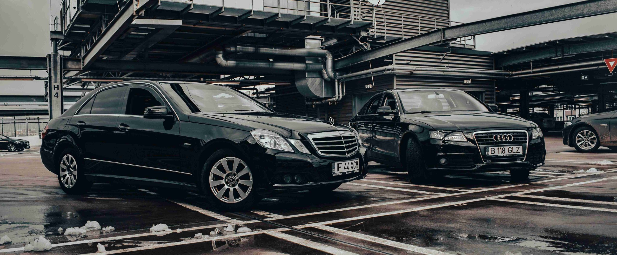 Mercedes-Benz W212 and Audi A4 on Parking Lot