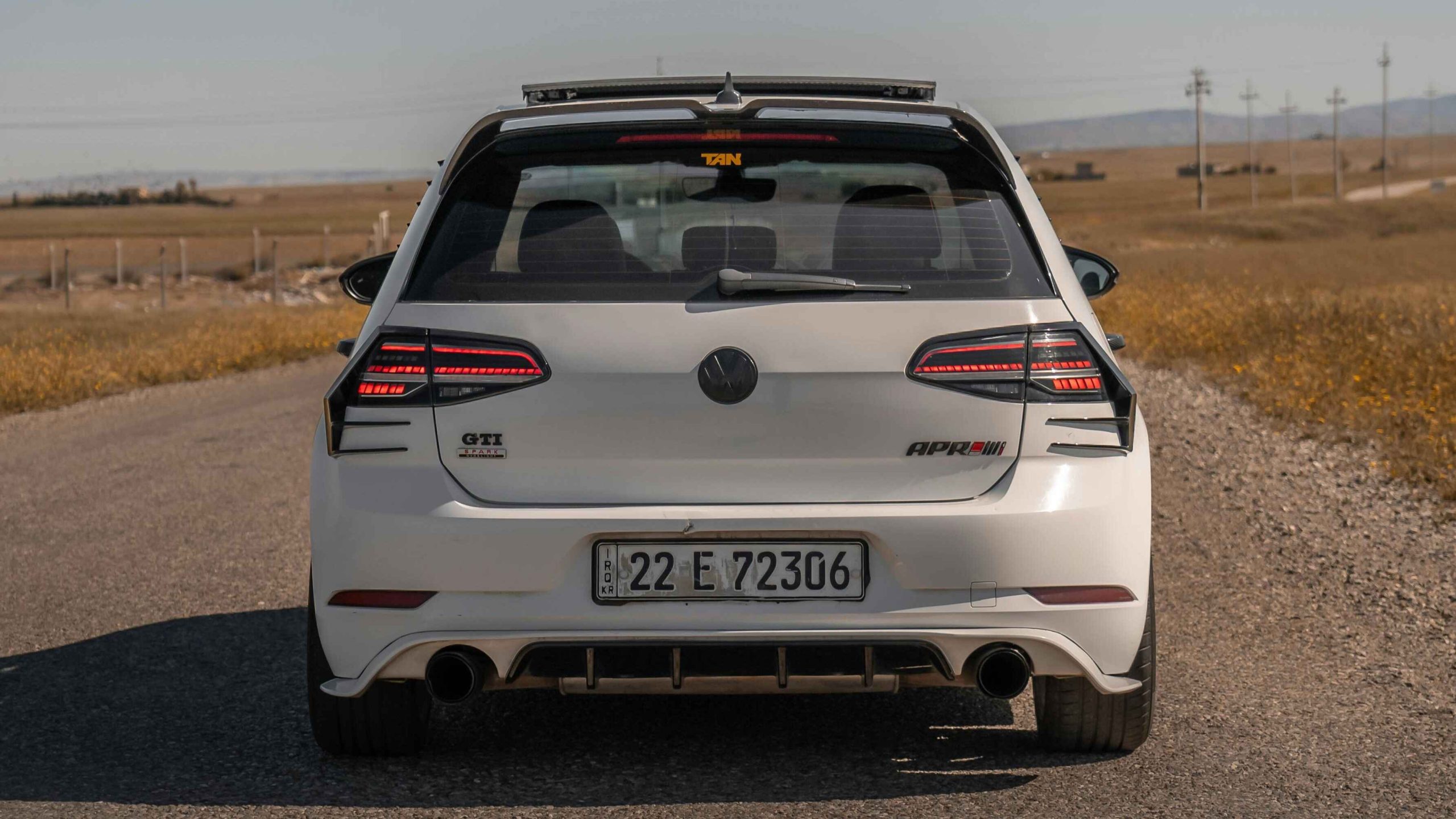 Rear View of White Volkswagen Golf R